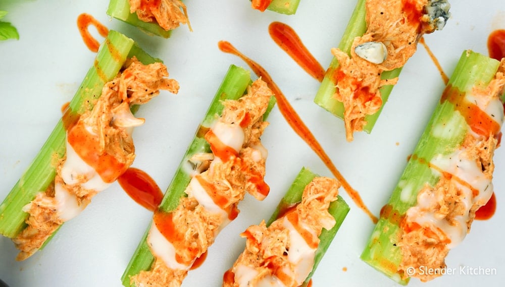 Weight Watchers Buffalo Chicken Celery Bites with ranch dressing and blue cheese.