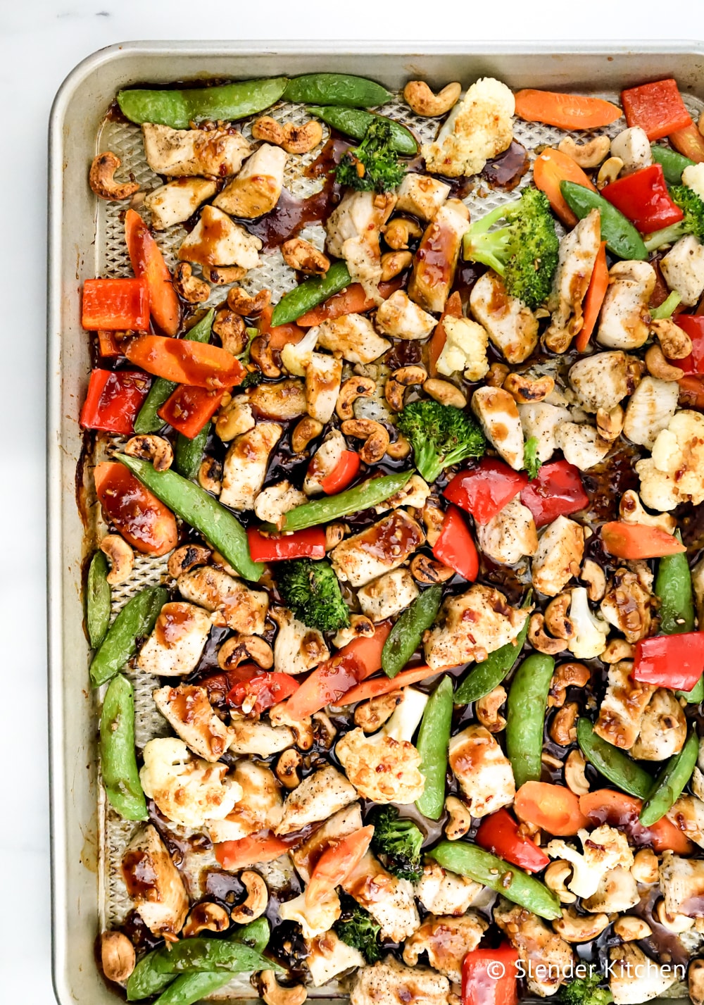 Weight Watchers Cashew Chicken with Vegetables made on a sheet pan.