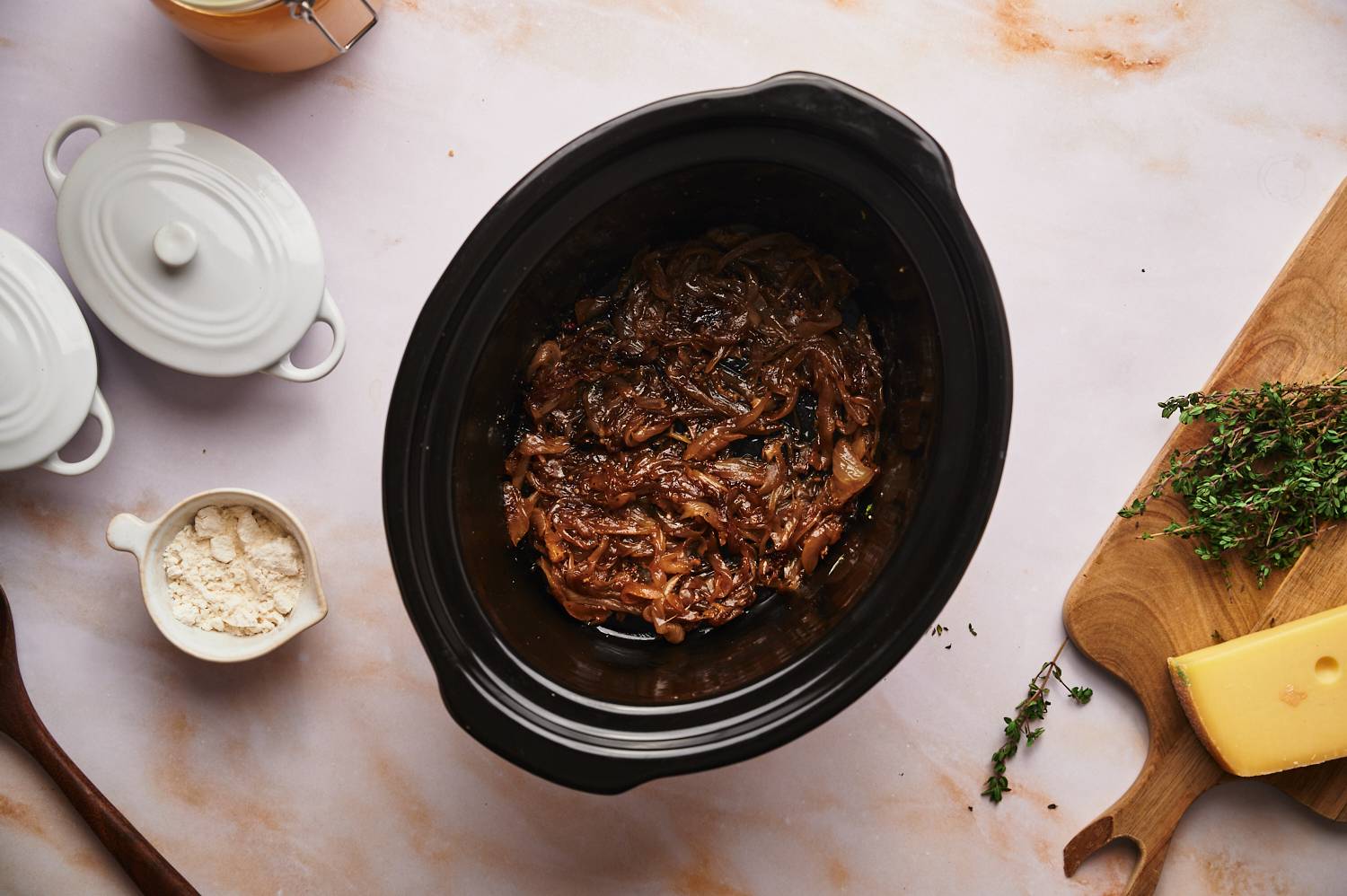 Caramelized onions in a slow cooker for French onion soup.