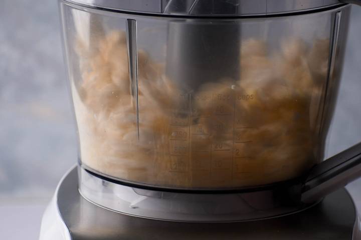 Cauliflower florets in a food processor.