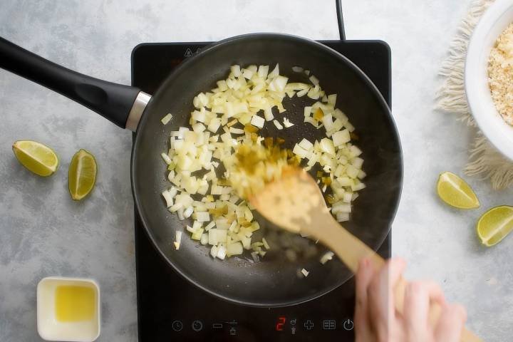 Onions, jalapenos, and garlic in a skillet.