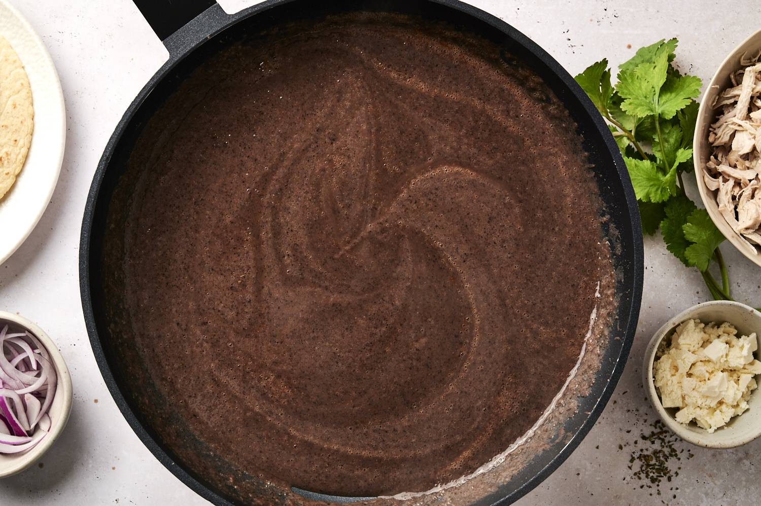 Blended beans in a cast iron pan