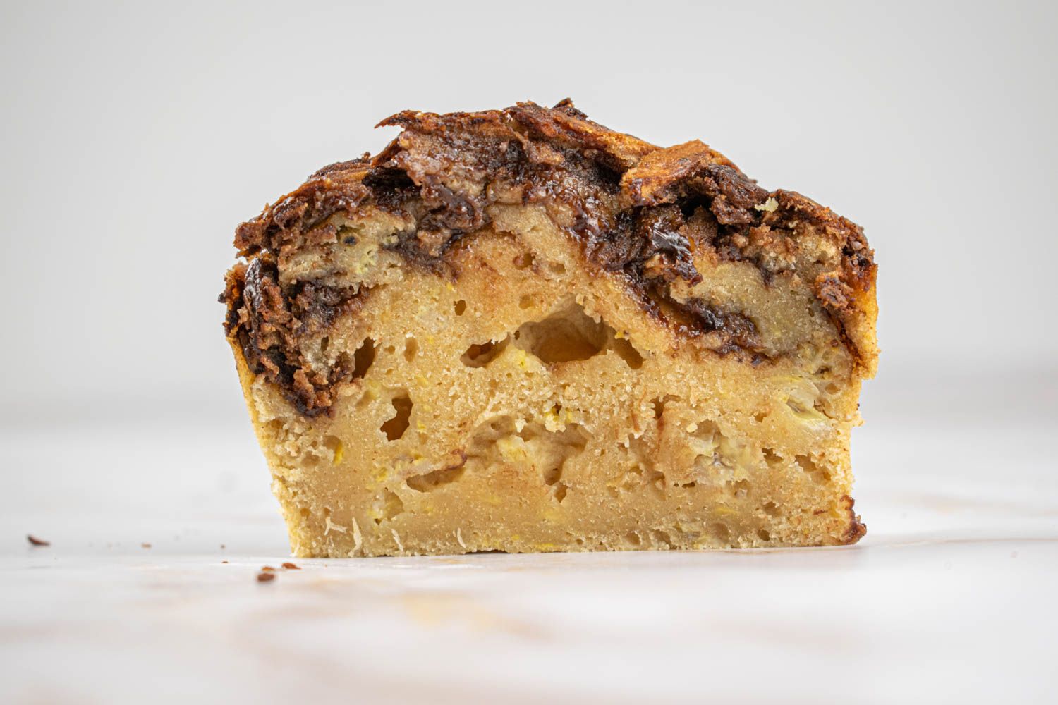 Banana bread baked with nutella spread and sliced.