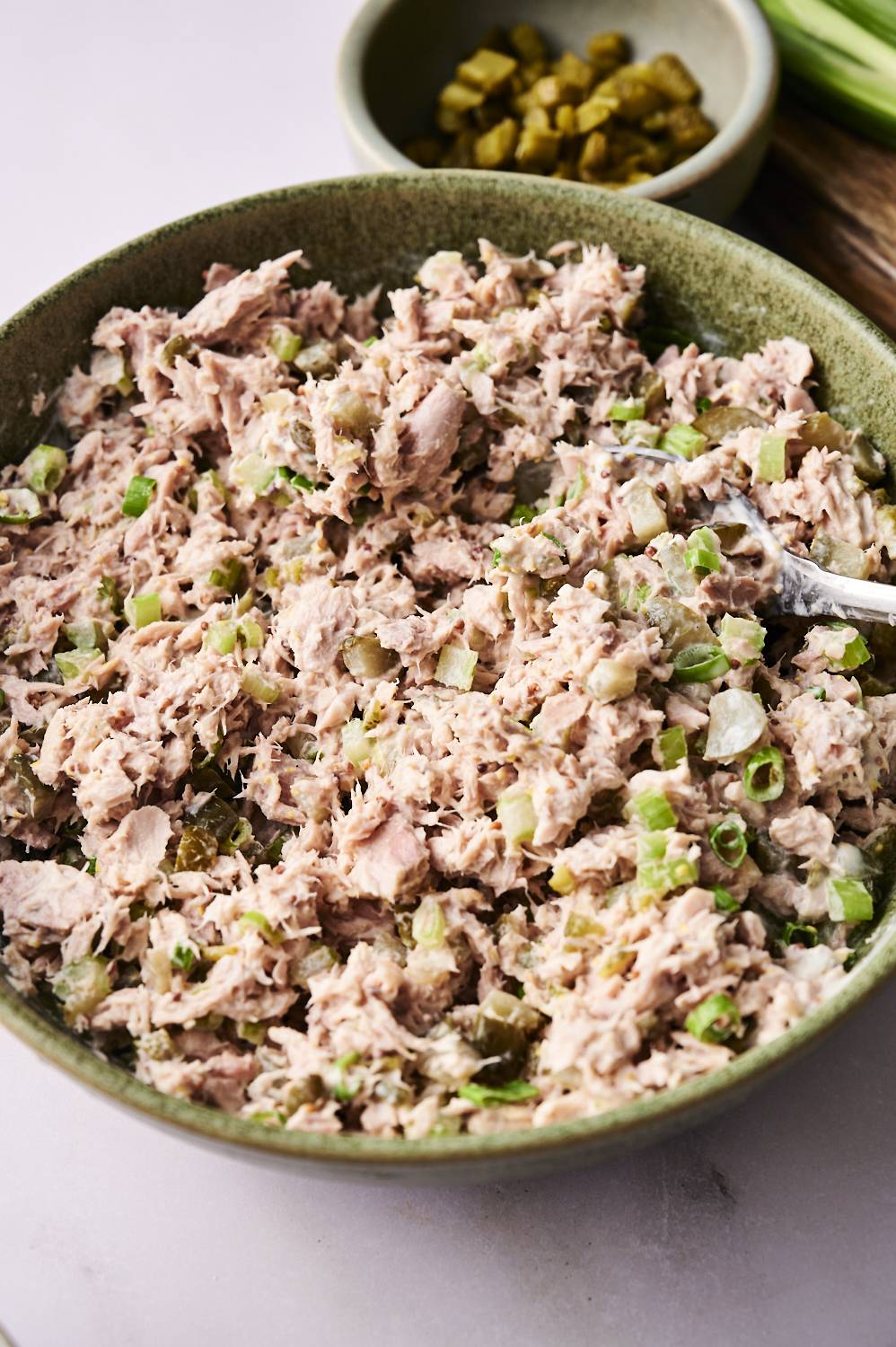 A close-up of a bowl of dill pickle tuna salad.
