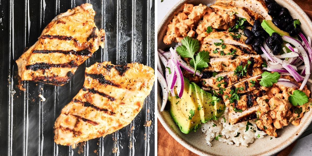 Grilled chicken fillets with char marks on a grill, served in a bowl with rice, black beans, avocado, and fresh vegetables.