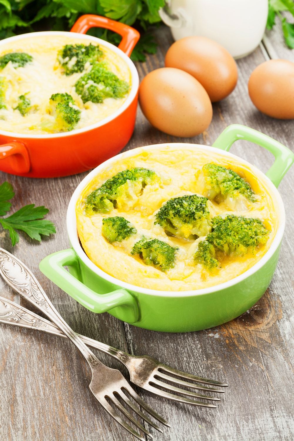 Microwave Omelet with Broccoli and Cheddar Cheese in a ramekin.