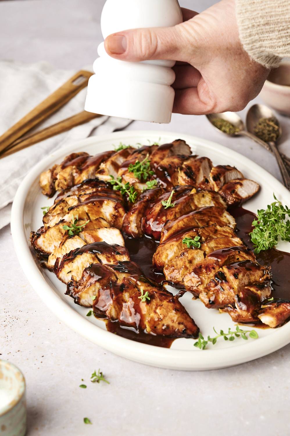 Marinated turkey tenderloin served sliced on a serving dish.