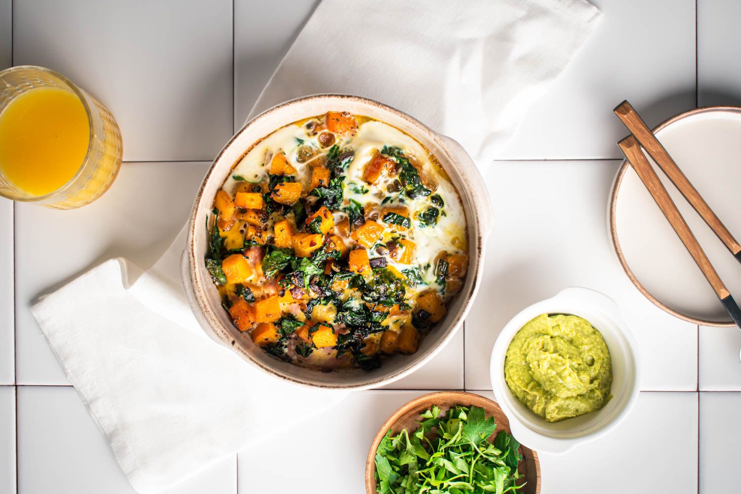 Butternut squash breakfast casserole with sausage and spinach.
