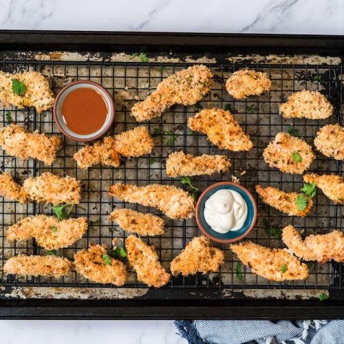 Buffalo chicken tenders coated with panko breadcrumbs and ranch served with ranch dressing and buffalo sauce.
