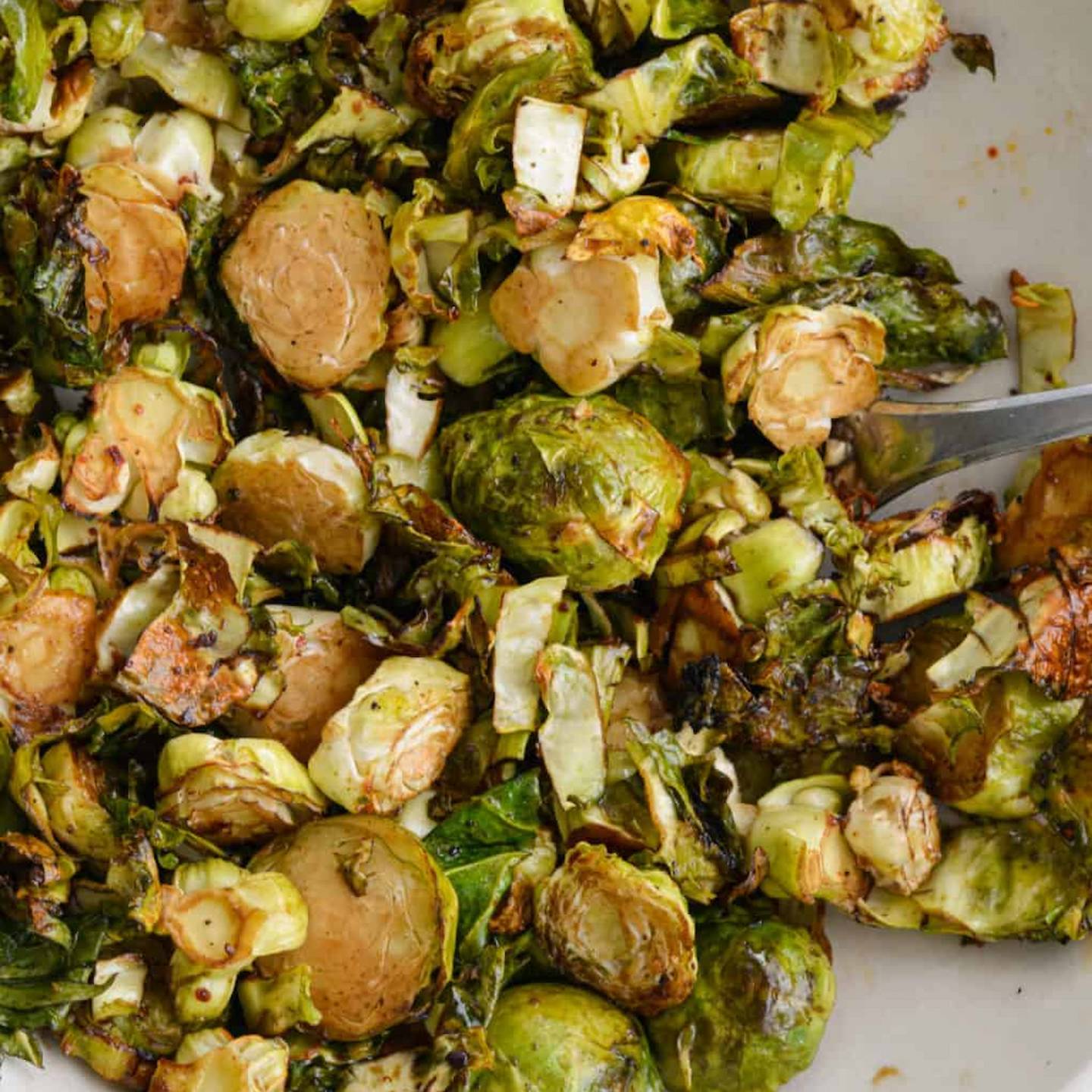 Air Fryer Brussels Sprouts with Balsamic Glaze in a bowl.