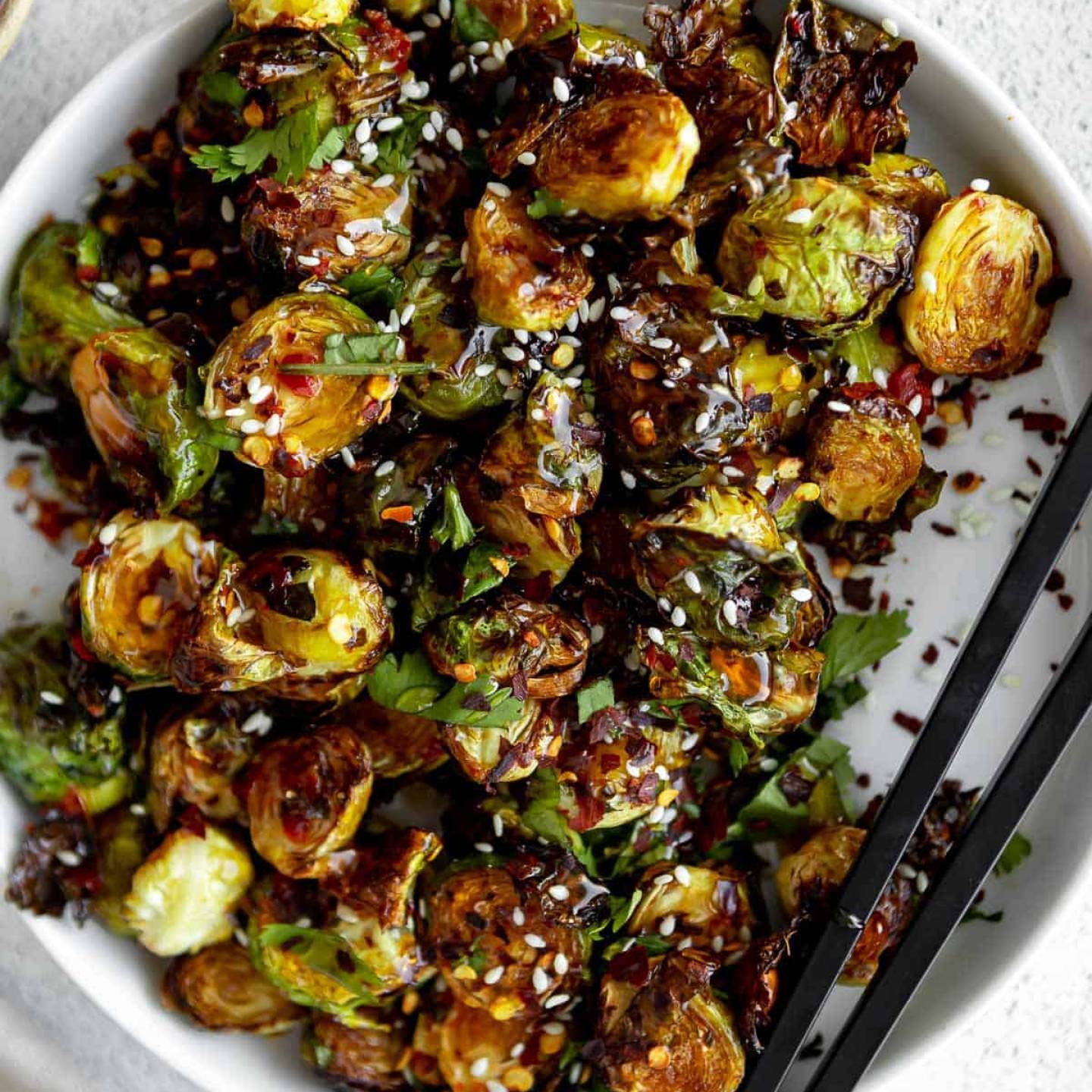 Chili Garlic Air Fryer Brussels Sprouts with sesame seeds.
