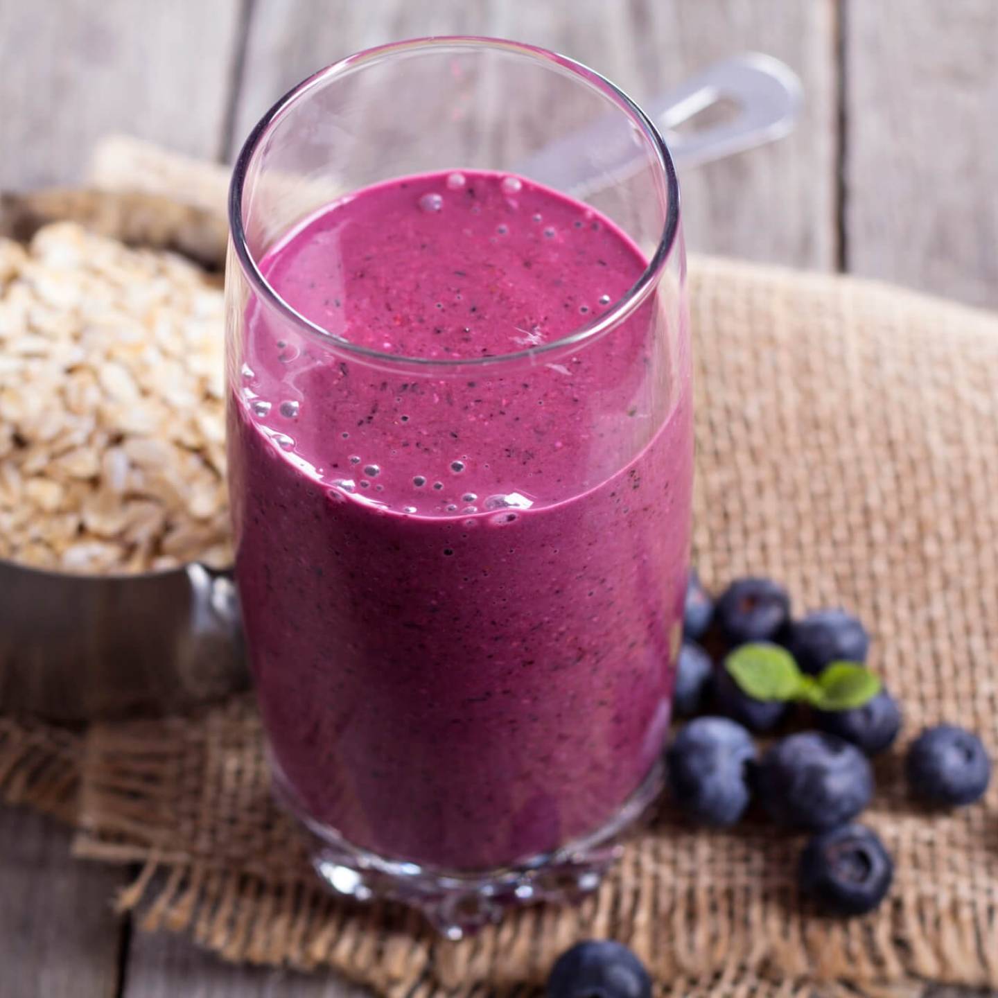 Oatmeal smoothies made with blueberries in a glass. 