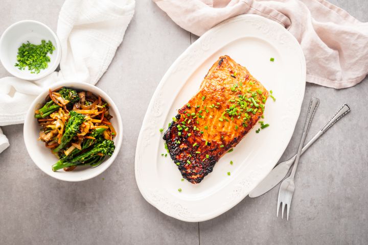 Brown sugar salmon with a crispy top and served with stir fried vegetables. 