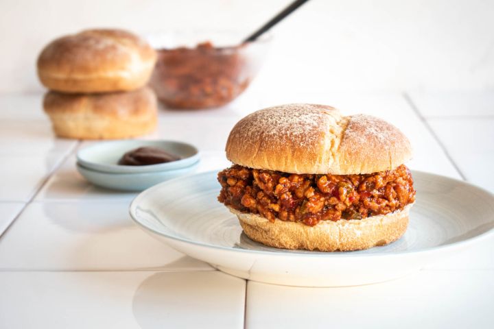Ground turkey sloppy joes with bell peppers, lean ground turkey, and sloppy joe sauce served on a whole grain bun.