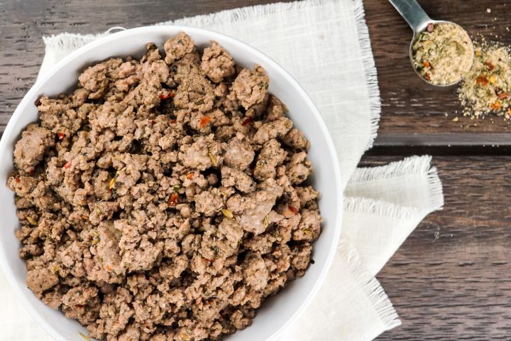 Italian sausage seasoning cooked with ground turkey in a skillet.