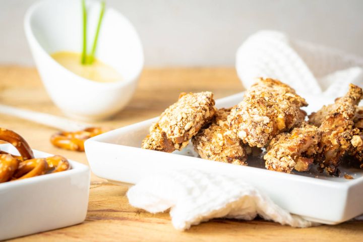 Pretzel chicken fingers with honey mustard dressing.