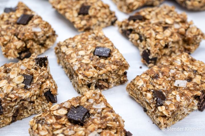 No Bake Oatmeal bars with chocolate chips on parchment paper.