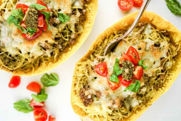 Pesto spaghetti squash with melted cheese, turkey sausage, and diced tomatoes.