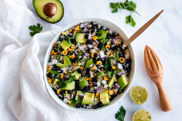 Southwest Quinoa Salad with black beans, corn, and cilantro dressing in a bowl.