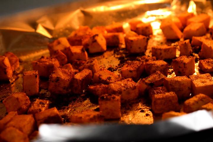Sweet potatoes with blackening seasoning baking.