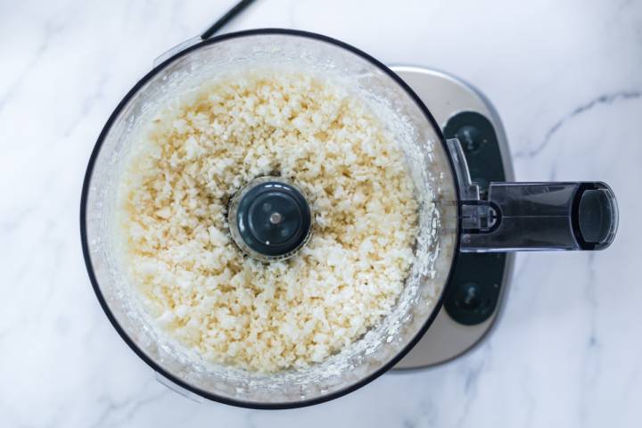 Cauliflower and garlic in a food processor.