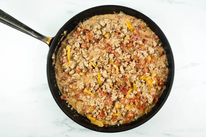 Ground chicken, peppers, onions, and garlic with a diced tomatoes and cream cheese sauce.