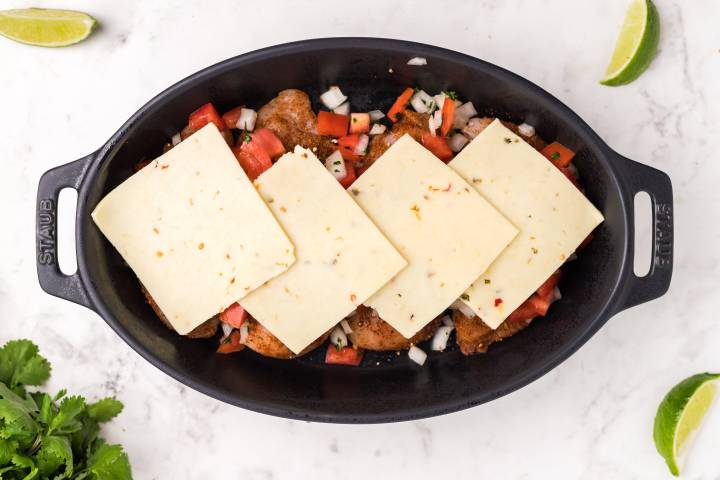 Salsa chicken breast with slices of pepper jack cheese on top. 