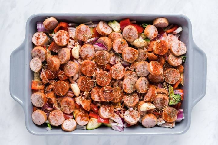 Chicken sausage, broccoli, peppers, onions, zucchini, and potatoes with spices.