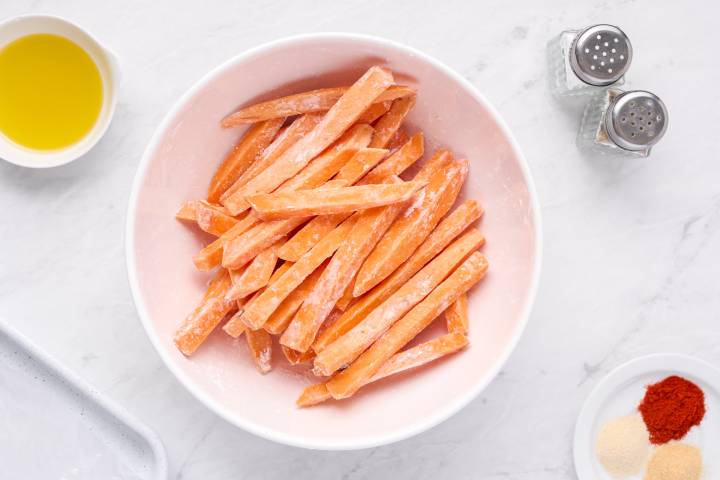 Sweet potatoes cut into fries tossed with cornstarch.