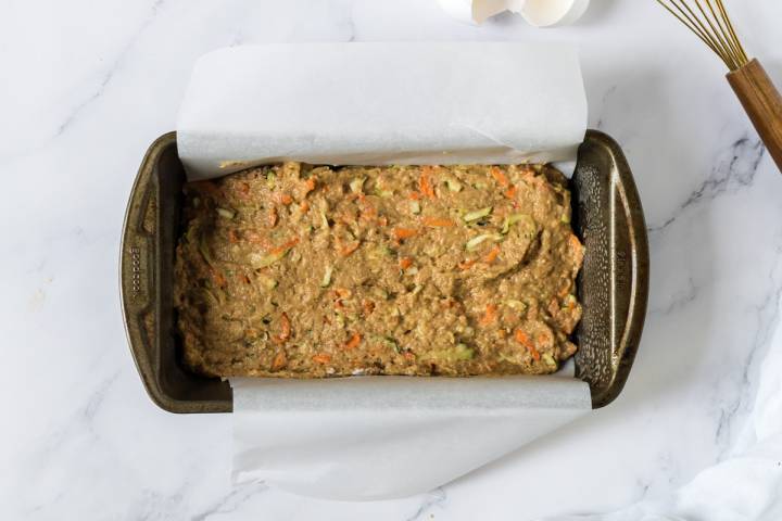 Carrot and zucchini bread batter in a pan before being baked