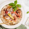 Red pepper chicken breast with sliced peppers, Parmesan cheese, and basil over rice.