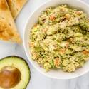 Avocado tuna salad with red onion, celery, and carrots.