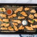 Buffalo chicken tenders coated with panko breadcrumbs and ranch served with ranch dressing and buffalo sauce.