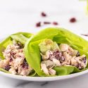 Chicken salad lettuce wraps with homemade cranberry and celery chicken salad wrapped in a butter lettuce leaf.