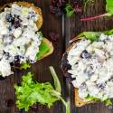 Cranberry Tuna salad with apples and celery served on toast with lettuce.