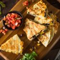 Healthy chicken quesadillas with pico de gallo on the side.