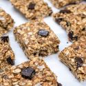 No Bake Oatmeal bars with chocolate chips on parchment paper.