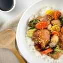 Slow Cooker Chicken Teriyaki and Vegetables with rice and chopsticks.