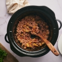 Slow cooker picadillo with ground meat, potatoes, and carrots with a spicy tomato sauce. 