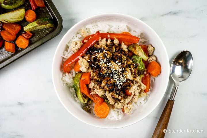 Asian rice bowls with white rice, vegtables, ground turkey, and soy sauce.