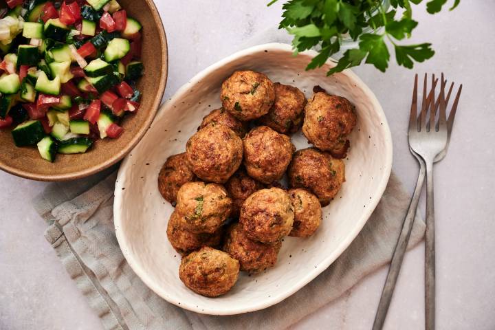 Greek meatballs with cucumber salad and tzatziki.