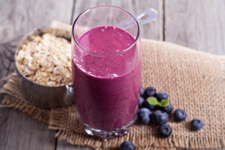 Oatmeal smoothies made with blueberries in a glass. 