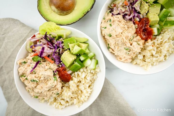 Spicy tuna bowls with spicy tuna salad, avocado, cucumbers, and brown rice.