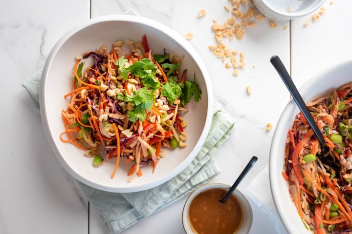 Asian peanut slaw with cabbage, jicama, carrots, cilantro, and edamame tossed in a peanut dressing.