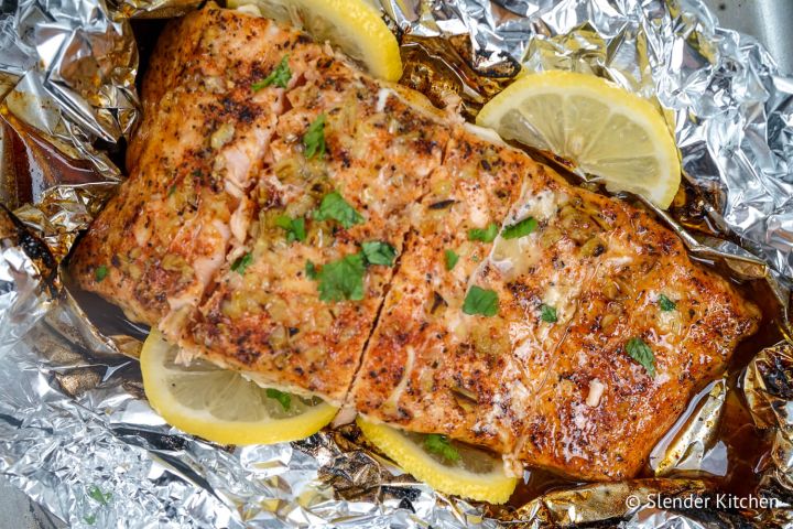 Baked Garlic Lemon Salmon wrapped in foil with honey and cilantro.