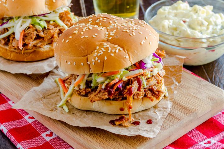 Slow Cooker Barbecue pulled turkey on a bun with coleslaw.