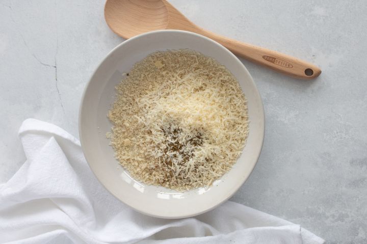 Parmesan, Panko breadcrumbs, and Italian seasoning in a bowl.