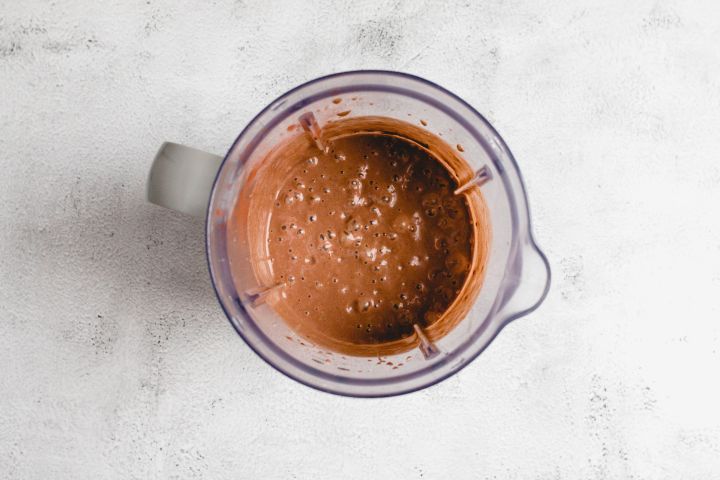 Chocolate avocado smoothie in a Vitamix blender.