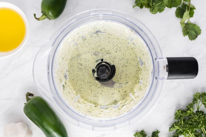 Jalapeno ranch dressing in a food processor.