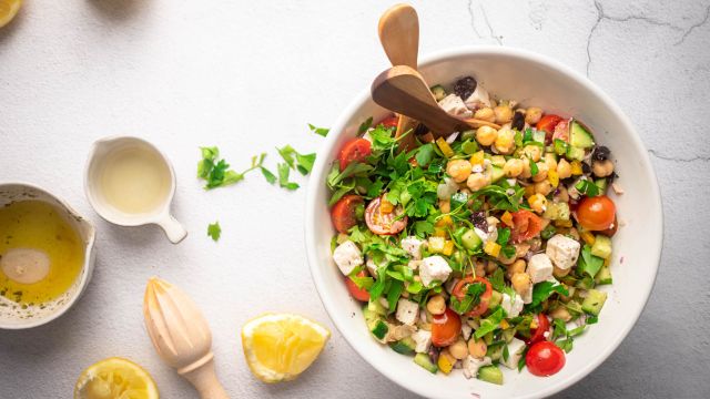 Chopped chickpea Greek salad ieth chickpeas, cucumbers, feta, olives, and fresh herbs in a lemon dressing.